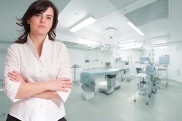 Female posing before operating room